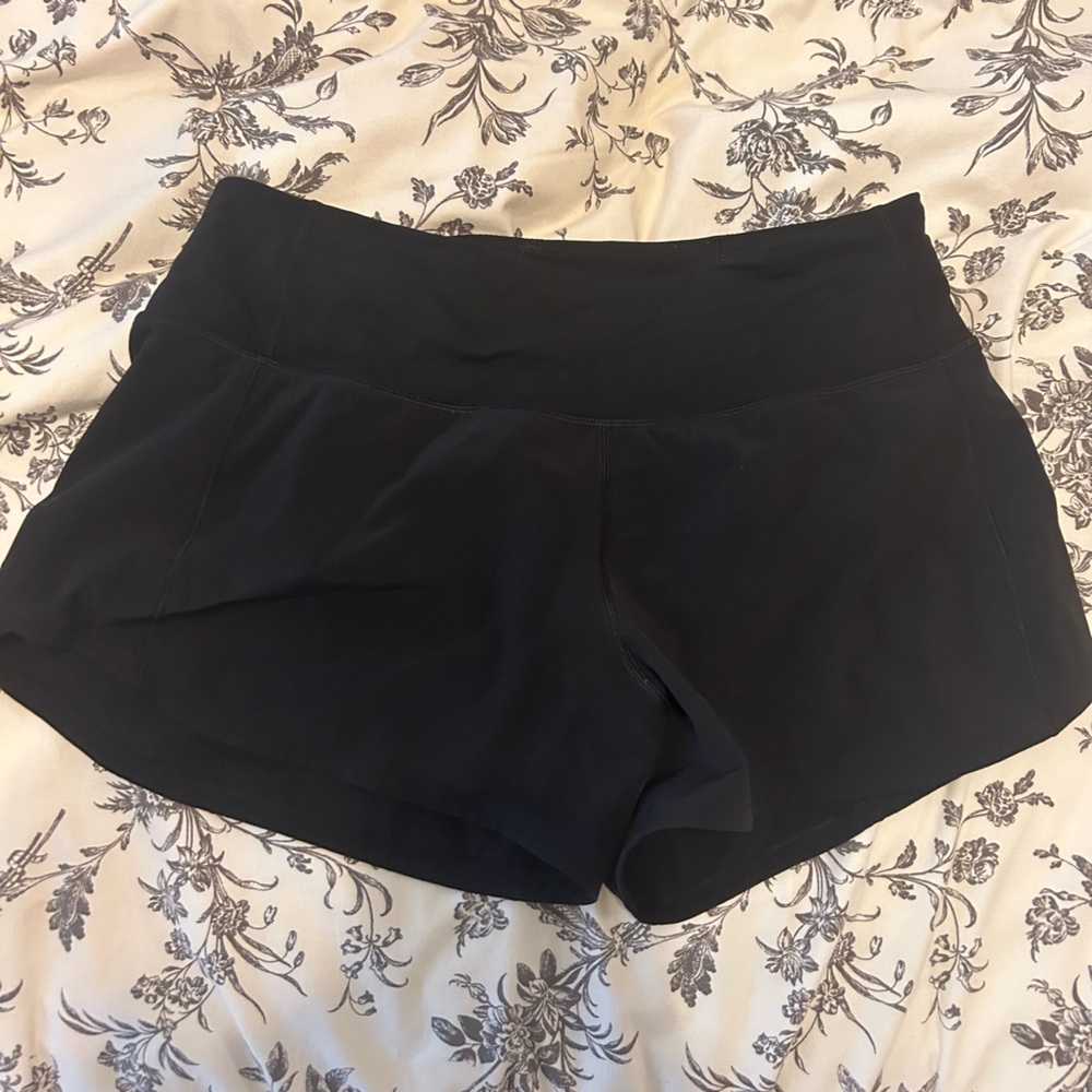 Black lululemon speed up style. Size 4. With tag still. They are 4 inch style.